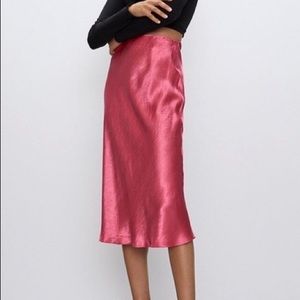 Beautiful pink Babaton slip skirt